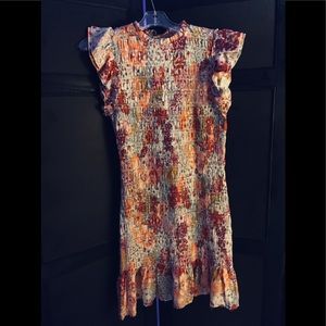 Lovely ruched dress. Springytime colors.